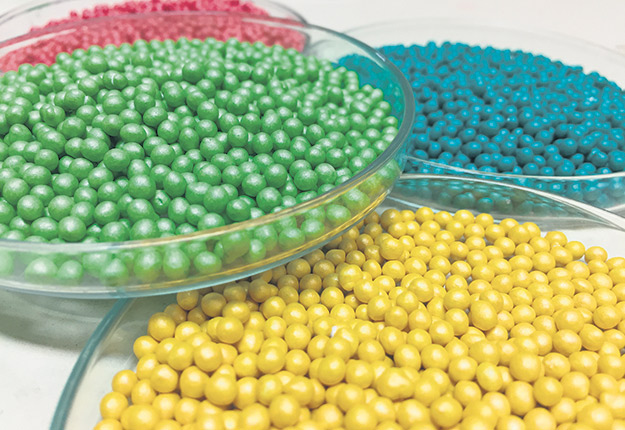 Granules de graines de laitue et enrobage de semences. Photo : Shutterstock